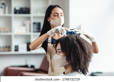 Hairdresser With Security Measures For Covid-19, Cutting Hair Of Woman With Medical Mask At Beauty Salon, Free Space