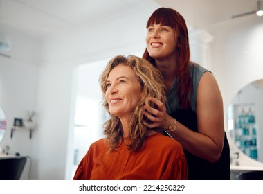 Hairdresser, senior woman client and hair care consultation with young hairstylist in training. Happy customer, stylish hairstyle cosmetic treatment and luxury beauty salon professional worker - Powered by Shutterstock