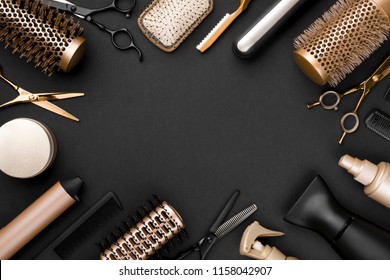 Hairdresser tools on black background with copy space in center - Shutterstock ID 1158042907