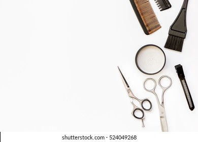 hairdresser tools on white background top view