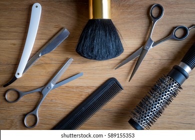 Hairdresser Tools On A Wooden Background
