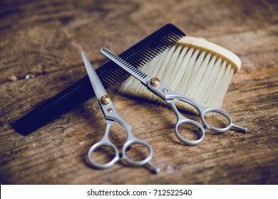 Hairdresser Tools On Wooden Table