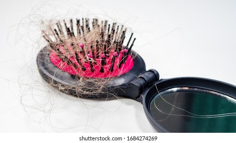 Hairloss Problem On Comb. Dry Frizzy Hair. Hormonal Disbalance Or Stress Concept