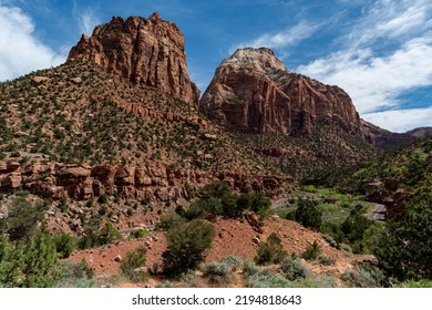 Hairpin Turn through the Mountains at Zion National Park in the Middle of a sunny Spring Day (Zion Park Road also known as Zion Mount Carmel Highway)