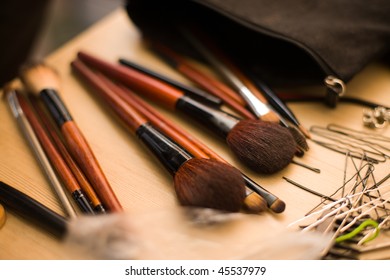 Hairpins And Brushes For Makeup On Table Selective Focus