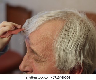 Hairstyle for grandpa on the couch