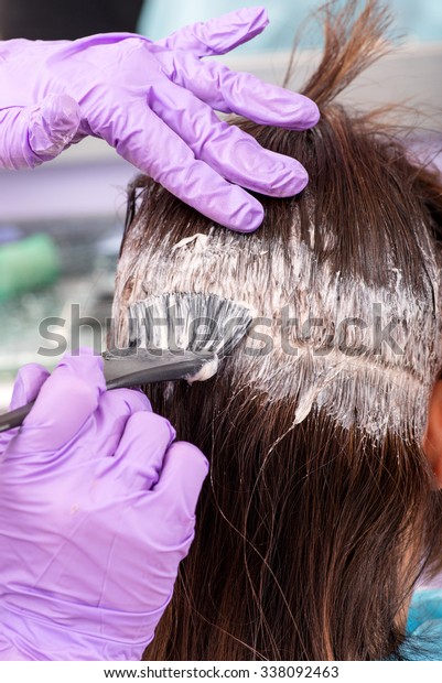 Hairstylist Applying Tint Roots Brown Hair Stock Photo Edit Now