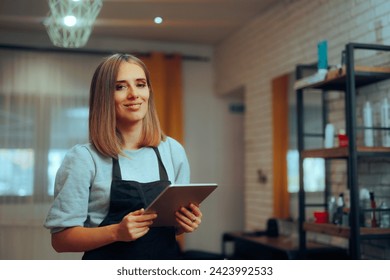 
Hairstylist Holding a Pc Tablet Making Appointments in Hair Salon. Hairdresser booking online new clients for her beauty business
 - Powered by Shutterstock