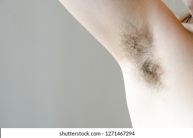 hairy woman's armpit, close-up, unshaven, a lot of hair on the armpit