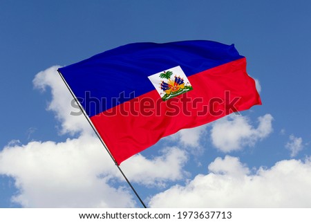 Haiti flag isolated on sky background with clipping path. close up waving flag of Haiti. flag symbols of Haiti.
