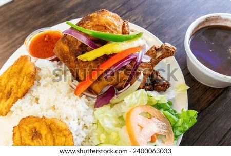 Haitian Fried Chicken Meal on White Plate 