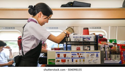 Hakodate, Japan - Aug 7, 2016 - An Unidentified Woman Pushed A Food Trolley To Sell Food On Train