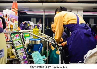 Hakodate, Japan - Aug 7, 2016 - An Unidentified Woman Pushed A Food Trolley To Sell Food On Train