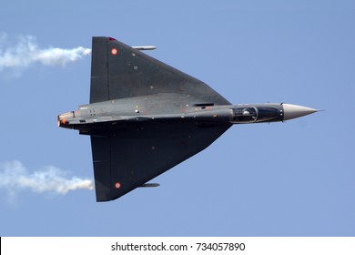 HAL Tejas Performing Aerobatic Maneuver With Smoke Trails.