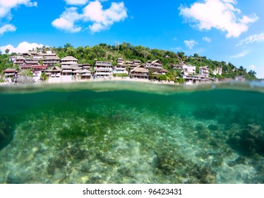 Hald underwater shot of Bingin bay beach in Bali