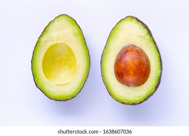 Half avocado Isolated on White Background with soft shadow - Shutterstock ID 1638607036