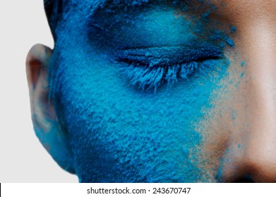 Half beauty face with blue makeup - Powered by Shutterstock