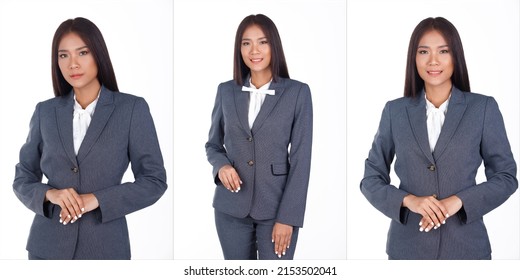 Half Body Portrait Of 20s Asian Business Woman Black Short Hair White Shirt Gray Suit Pant. Female Express Feeling Smart Smile Over White Background Isolated