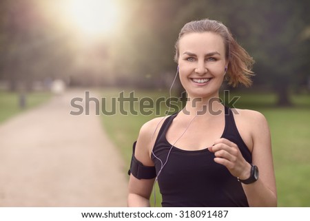 Similar – Attractive sporty woman with her cell phone