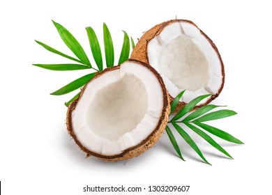 half of coconut with leaves isolated on white background