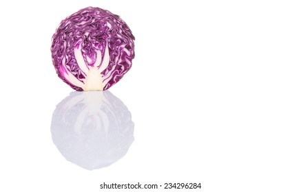 Half cut red cabbage over white background