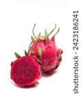 Half cut and whole fresh organic red dragon fruit delicious fruit top view isolated on white background clipping path