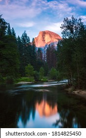 The Half Dome Over The Mercedes River At Sunset