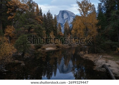 Half Dome reflected in the Merced River, framed by autumn foliage, Yosemite National Park, California. Photographed November 2, 2025.