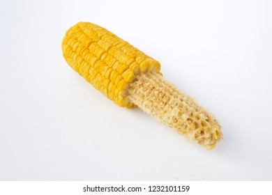 The Half Eaten Corn On The White Background. 