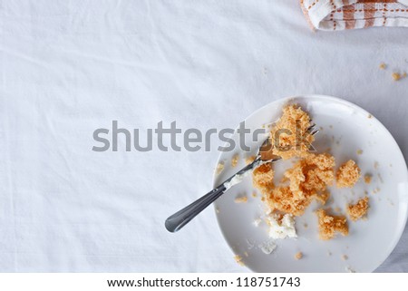 Half Eaten Slice of Orange Cake