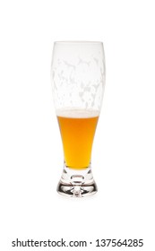 Half Empty Beer Glass With Foam On Glass