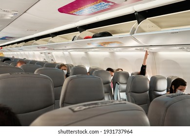 Half Empty Cabin Of A Passenger Plane. Empty Seats For Passengers. Airplane Interior. Turkey , Istanbul - 21.07.2020