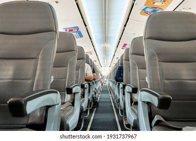 Half Empty Cabin Of A Passenger Plane. Empty Seats For Passengers. Airplane Interior. Turkey , Istanbul - 21.07.2020