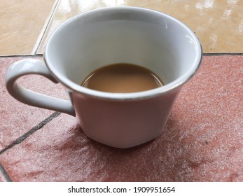 Half Empty Cup Of Morning Coffee 