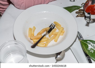 Half Empty Plate With French Fries Of A Child, Germany