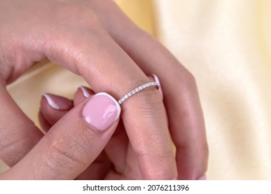 Half Eternity Diamond Ring On Woman's Finger