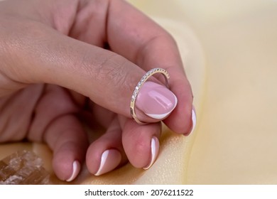 Half Eternity Diamond Ring On Woman's Finger