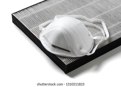 A Half Face Dust Mask And HEPA Filter Over White Background. 