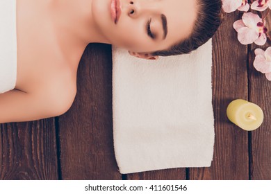 Half Face Portrait Of Young Beautiful Woman In Sauna