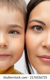 Half Face Of Son And Mother Close Up. Two Halves Of The Face Of The Parent And Child, Similar Eyes. Concept Of Generation, Genetics And Heredity