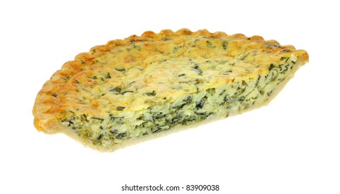 Half of a freshly baked spinach quiche pie on a white background.