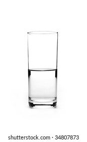 Half Full Glass Of Water Is Isolated On A White Background