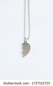 Half Heart Locket On White Background