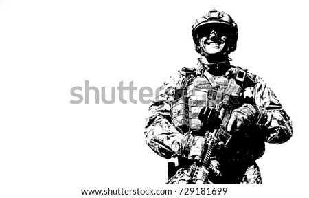 Half length low angle location shot of special forces soldier in field uniforms with weapons, monochrome