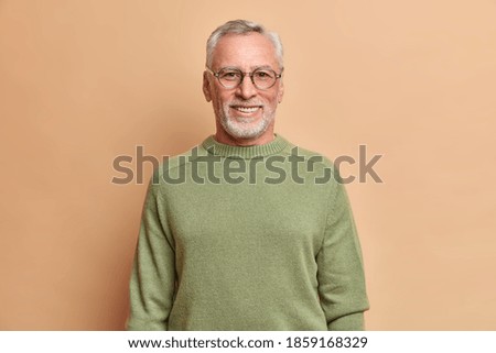 Similar – Image, Stock Photo Portrait of a bearded mature adult casual businessman with glasses looking into camera