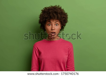 Similar – Image, Stock Photo Young woman with impressive green eyesvkissing a carp, fish
