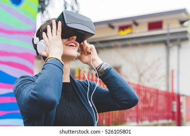 Half length of young beautiful caucasian business woman using 3D viewer - futuristic, technology concept - Powered by Shutterstock