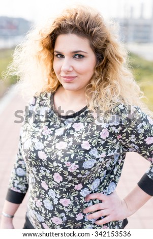 Similar – Happy curvy girl with curly hair