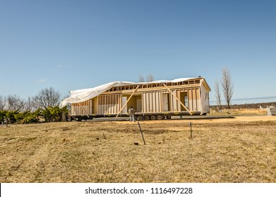 Half Of A Manufactured Home Ready To Be Set On Its Site