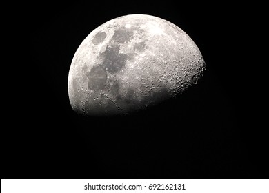 Half Moon Background / The Moon is an astronomical body that orbits planet Earth, being Earth's only permanent natural satellite - Shutterstock ID 692162131
